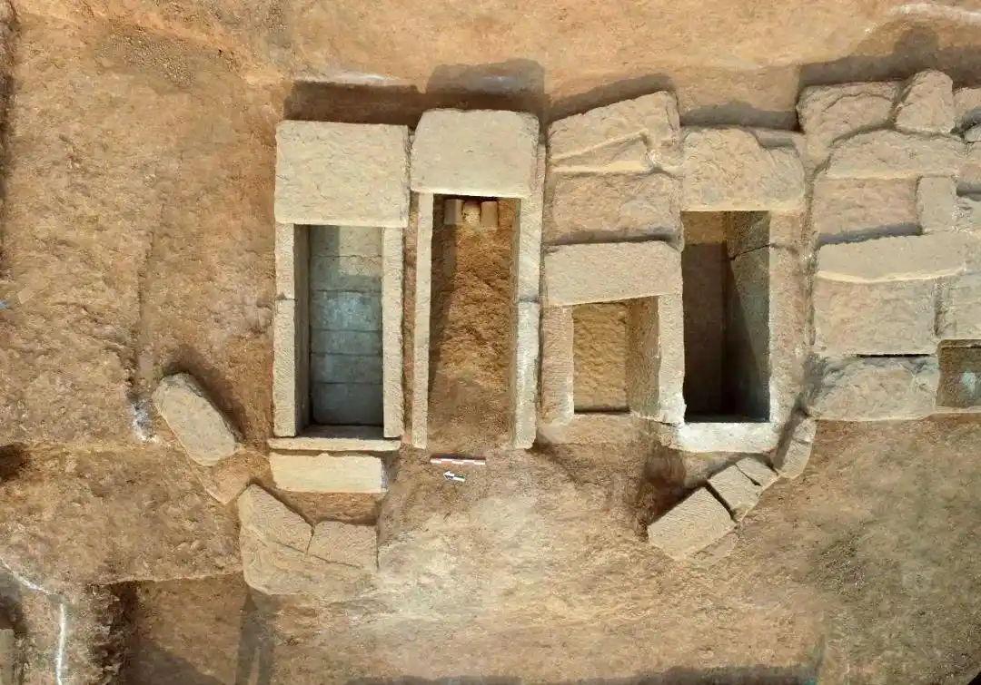 Close view of chamber construction with dressed stone slabs